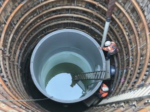 A view down the excavated pump well